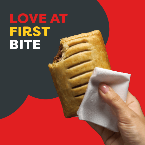 Hand holding a freshly baked pastry snack